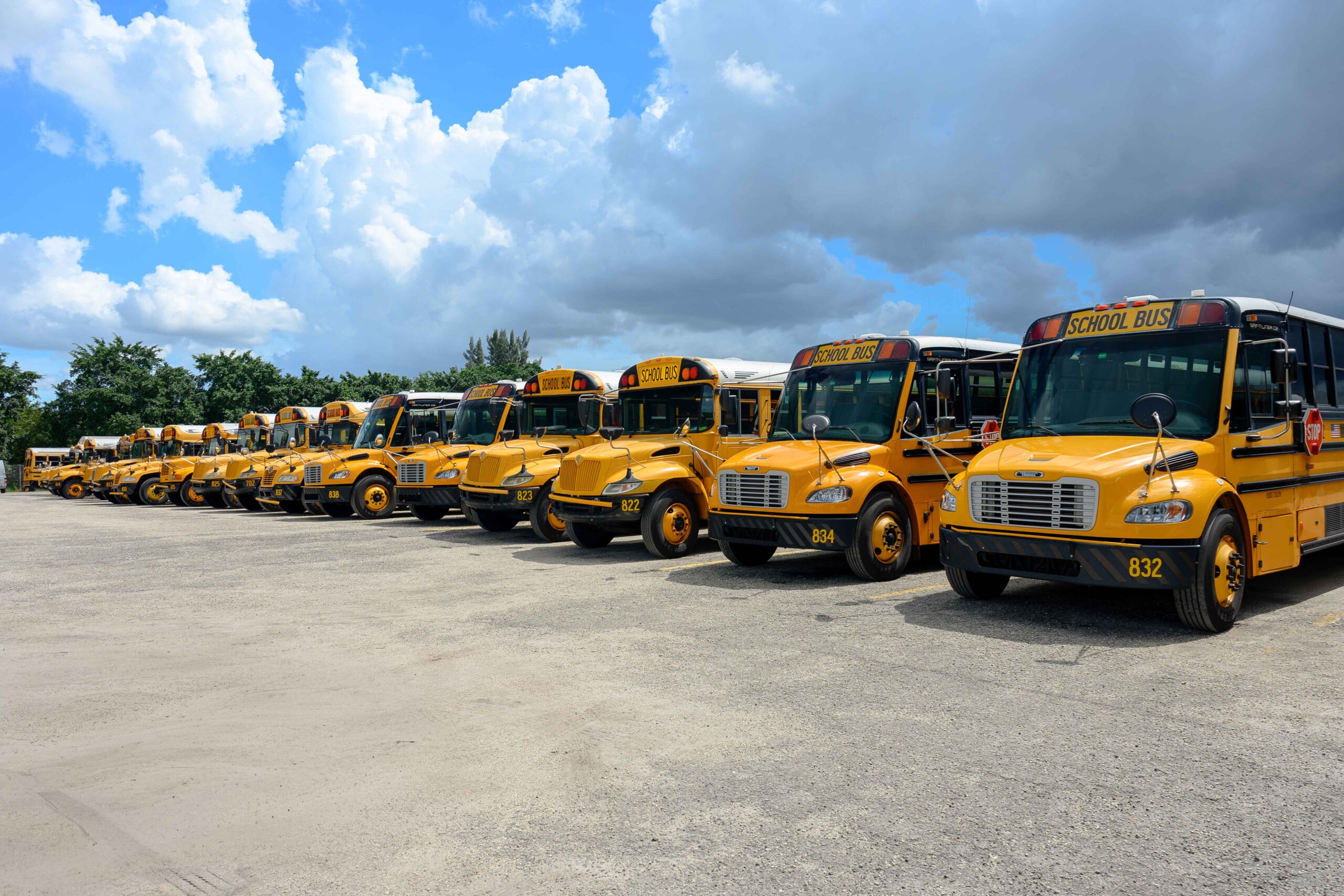 E2E Transportation team in front of school bus